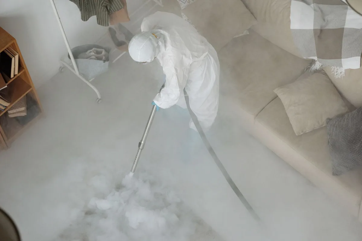 Biohazard cleanup technician in protective equipment, Los Jardines, San Antonio, TX
